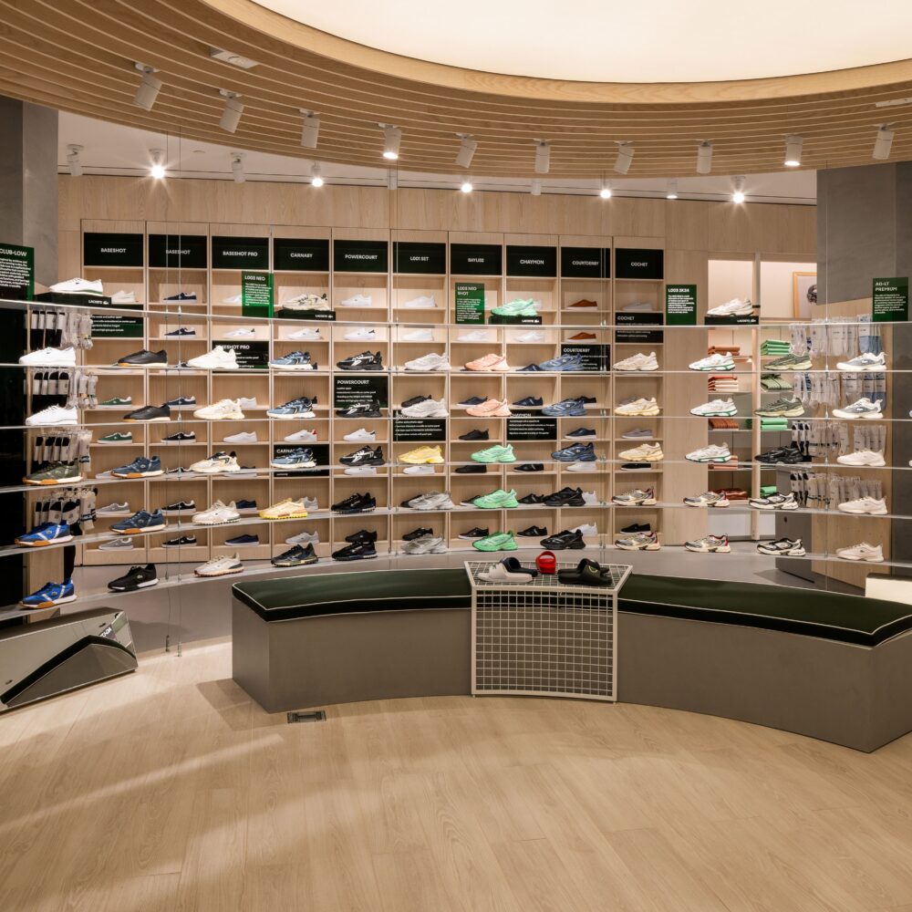 Right section of the second-floor circular display at Lacoste Flagship Store, Fifth Avenue, New York, highlighting shoes with Zeplinn’s architectural lighting.
