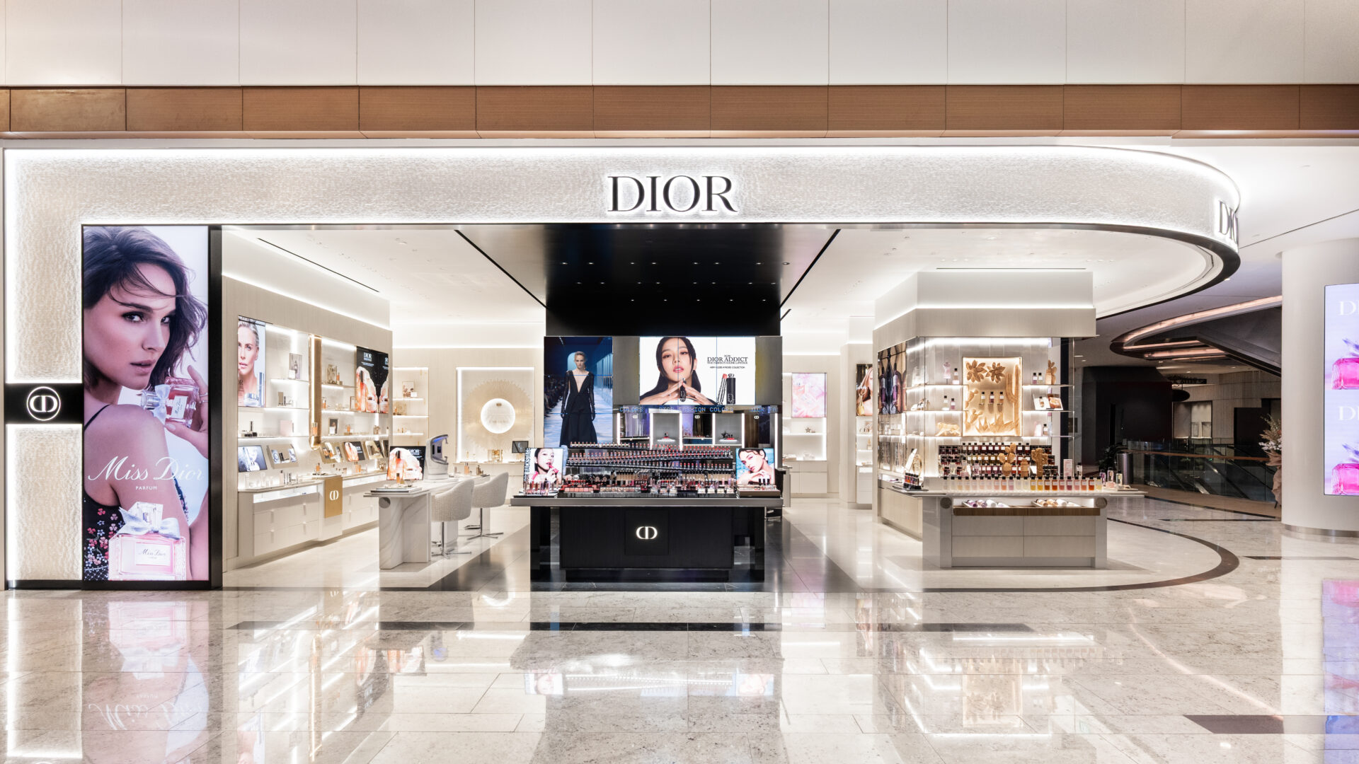 Exterior view of Parfums Christian Dior boutique at Raffles City Singapore featuring elegant façade lighting supplied by Zeplinn.