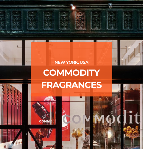 "Interior of Commodity Fragrances boutique in New York featuring modern minimalist design, elegant lighting, neatly displayed fragrance bottles, and a welcoming shopping environment.