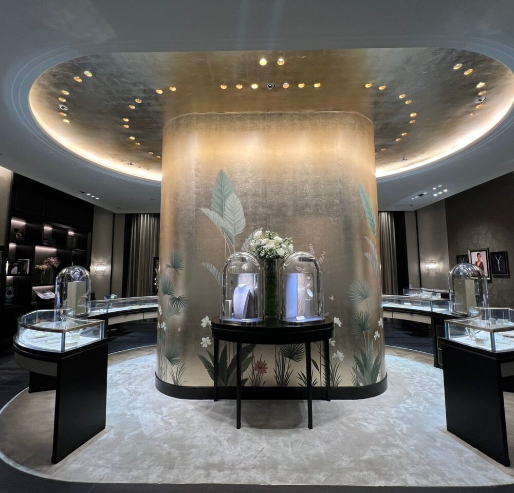 Interior of Van Cleef & Arpels boutique at Siam Paragon, Bangkok, showing the other side of the rounded pillar and illuminated jewelry displays by Zeplinn.