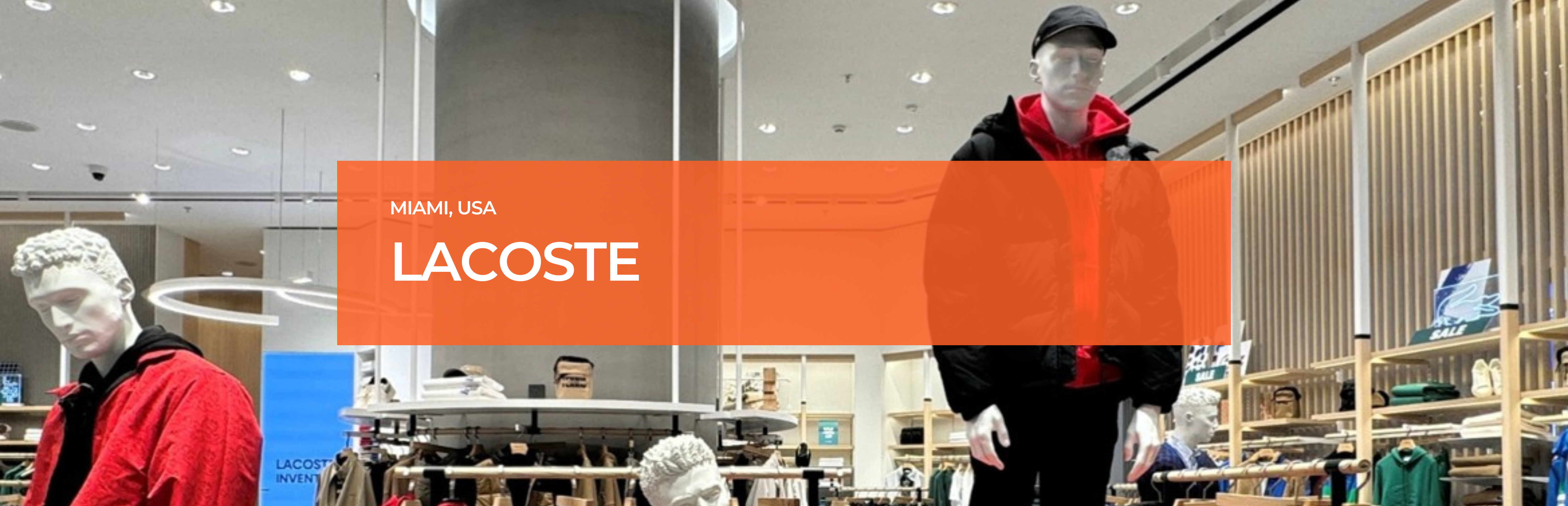 Interior of Lacoste USA store with mannequins illuminated by Zeplinn architectural lighting