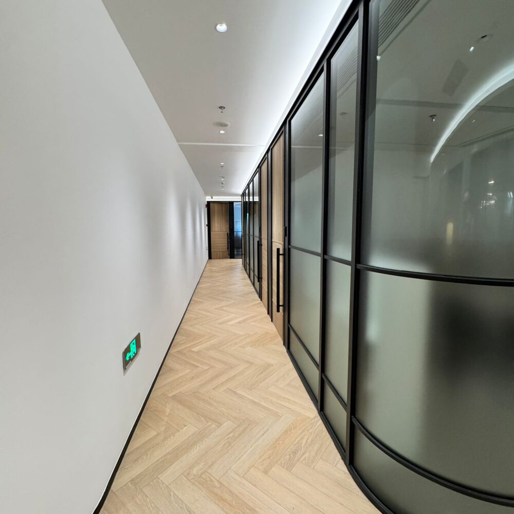 Office corridor at French Chamber of Commerce Shanghai under Zeplinn architectural lighting