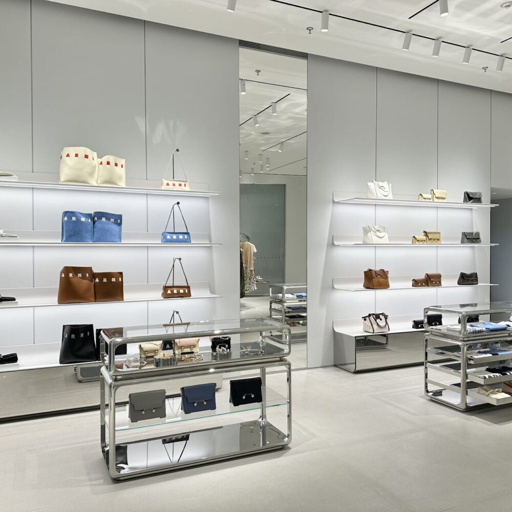 Left view of Marni Changsha boutique showcasing handbags on illuminated shelves under Zeplinn’s 3500K architectural lighting.