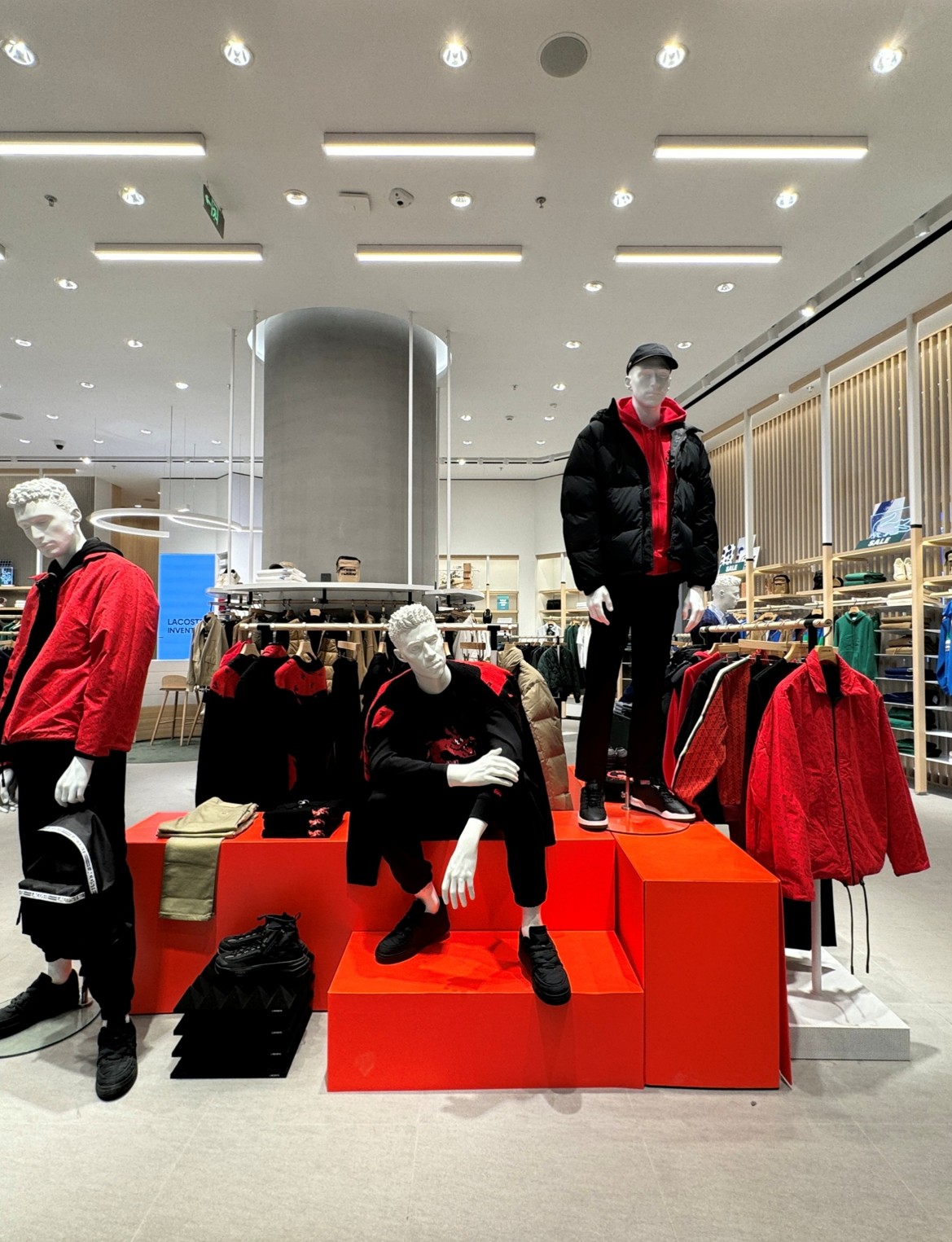 Interior of Lacoste Miami store with mannequins illuminated by Zeplinn architectural lighting