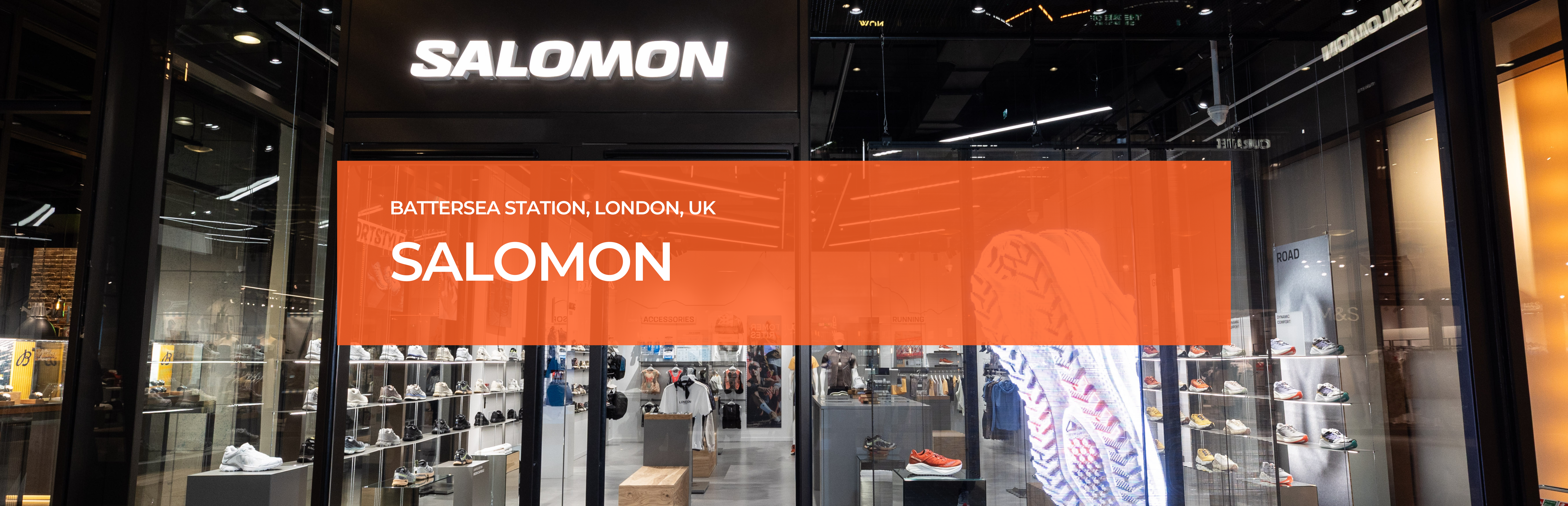 Entrance of Salomon Battersea store illuminated by Zeplinn fixtures, with a holographic shoe display and precision 4000K CRI95 lighting.