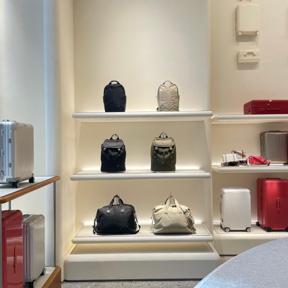 RIMOWA luggage displayed on illuminated shelves at the 5th Avenue flagship lit by Zeplinn architectural lighting